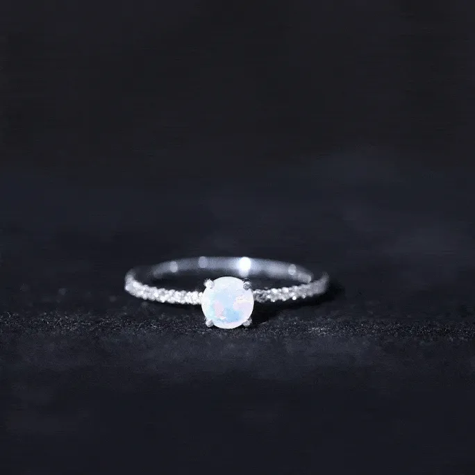 Simple Ethiopian Opal and Diamond Solitaire Ring